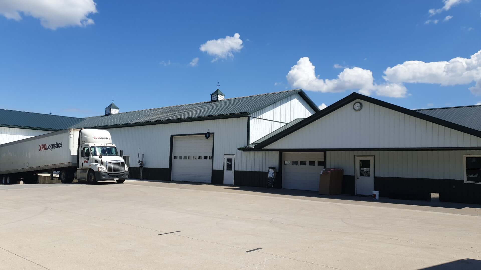 Pines RV building with truck in loading dock